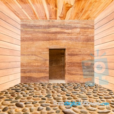 Stone Wall With Door And Stone Floor In Wooden Room Stock Photo