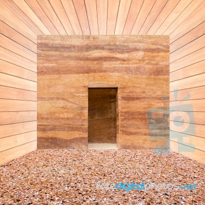 Stone Wall With Door And Stone Floor In Wooden Room Stock Photo