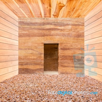 Stone Wall With Door And Stone Floor In Wooden Room Stock Photo