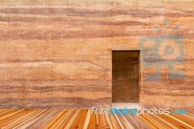 Stone Wall With Door And Wood Floor In Front Off Stock Photo