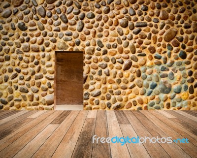 Stone Wall With Door And Wood Floor In Front Off Stock Photo