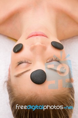 Stones Face Of A Woman In Spa Stock Photo