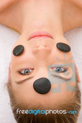 Stones Face Of A Woman In Spa Stock Photo