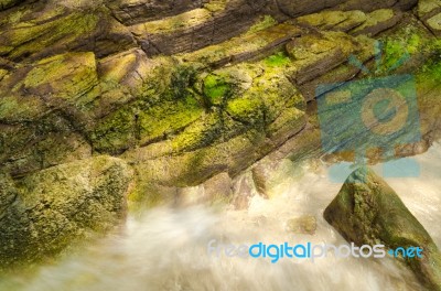 Stones On Beach And Sea Water Stock Photo