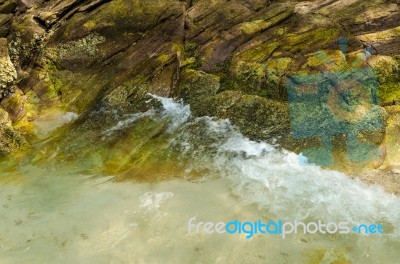 Stones On Beach And Sea Water Stock Photo