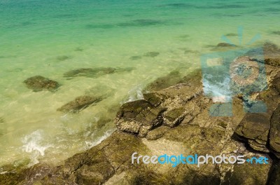 Stones On Beach And Sea Water Stock Photo