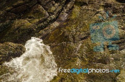 Stones On Beach And Sea Water Stock Photo