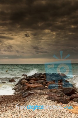 Storm Over Breakwater Stock Photo