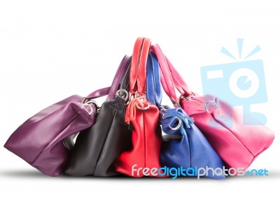 Strack Of Luxury Fashion Female Handbag On White Background Stock Photo