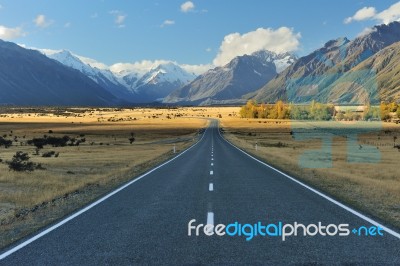 Straight Empty Highway Leading Into Aoraki-mount Cook Stock Photo