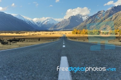 Straight Empty Highway Leading Into Aoraki-mount Cook Stock Photo