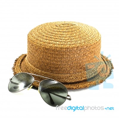 Straw Hat And Sunglasses Stock Photo