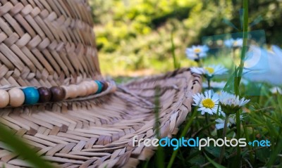 Straw Hat In The Grass Stock Photo