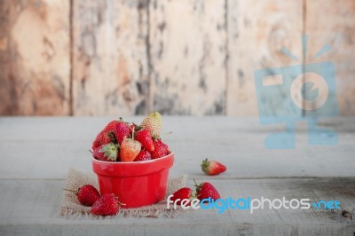 Strawberries In Red Cup Stock Photo