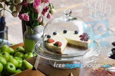 Strawberry And Blueberry Cheesecake On Cake Stand Stock Photo