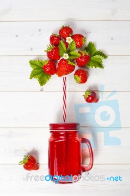 Strawberry Smoothie In Mason Jar With Straw Stock Photo