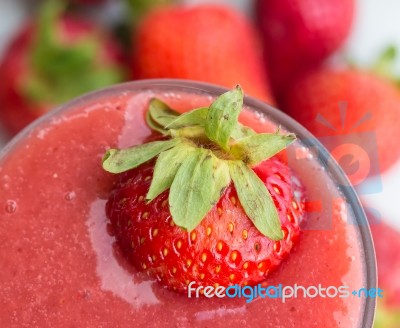 Strawberry Smoothie Shows Fruity Blended And Juicy Stock Photo