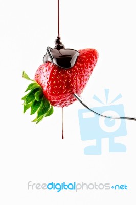 Strawberry With Liquid Chocolate Stock Photo