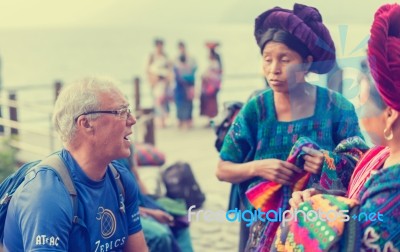 Street Vendors In The Busy Tourist Town Of Panajachel, Guatemala… Stock Photo