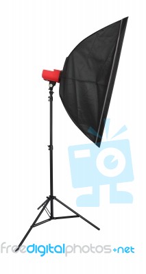 Strobe Flash Light With Stand And Softbox On White Background Stock Photo