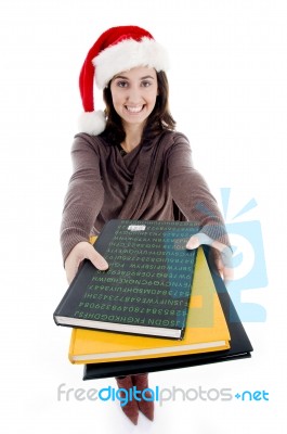 Student Giving Notebook Stock Photo