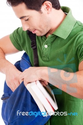 Student Looking Through Bag Stock Photo