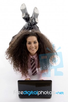 Student Lying With Laptop Stock Photo