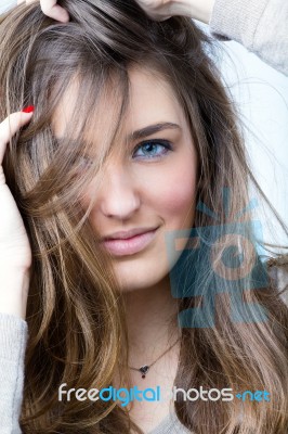 Studio Portrait Of Beautiful Young Woman Stock Photo