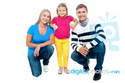 Studio Portrait Of Charming Young Family Stock Photo