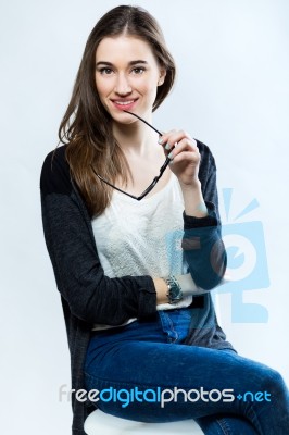 Studio Portrait Of Young Working Woman Stock Photo