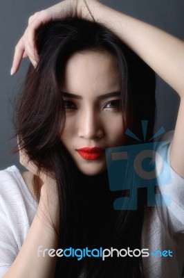 Studio Shot, Close Up Face Of Beautiful Asian Woman Model Black Stock Photo