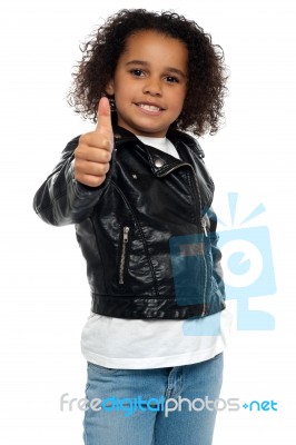 Stylish Child Savoring Sweet Success Stock Photo