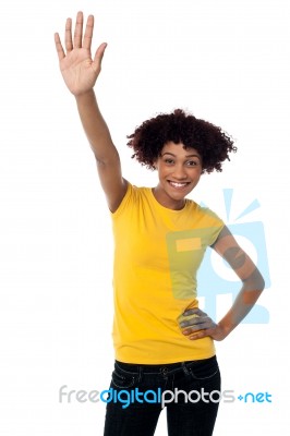 Stylish Female Waving Her Hand At You Stock Photo