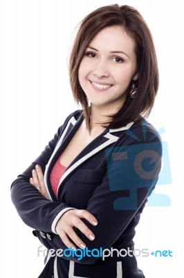 Stylish  Lady Posing With Arms Crossed Stock Photo