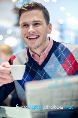 Stylish Man Drinking A Coffee At The Cafe Stock Photo