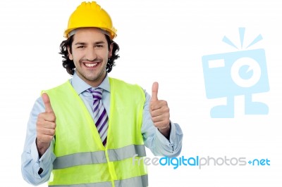 Successful Engineer Showing Thumbs Up Stock Photo