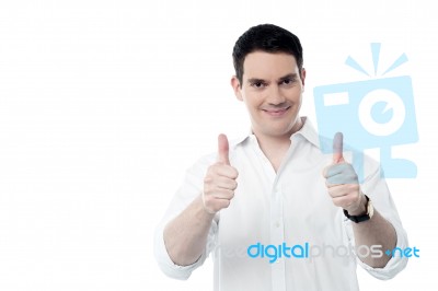 Successful Man Showing Thumbs Up Gesture Stock Photo