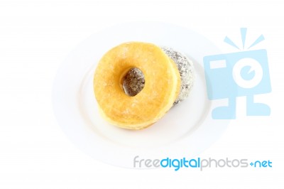 Sugar And Chocolate Donut  On Dish On White Background Stock Photo