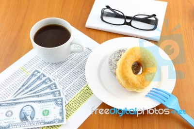 Sugar And Chocolate Donut On Working Table Stock Photo