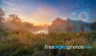 Summer Misty Sunrise On The River. Foggy River In The Morning. P… Stock Photo