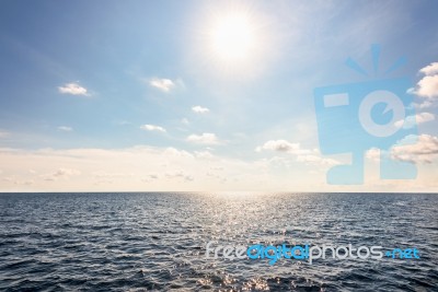 Sun On Blue Sky And Sea In Summer Thailand Stock Photo