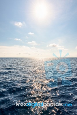 Sun On Blue Sky And Sea In Summer Thailand Stock Photo