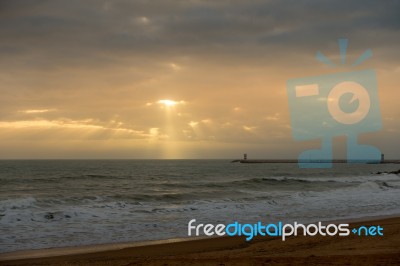 Sun Setting At Quarteira In Portugal Stock Photo