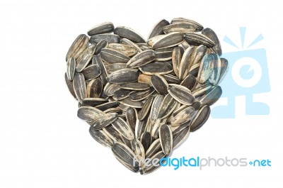 Sunflower Seed In Heart Shape Stock Photo