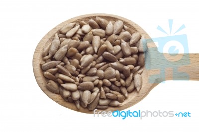 Sunflower Seeds On Wooden Spoon Stock Photo