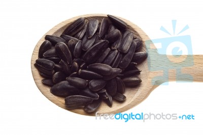 Sunflower Seeds On Wooden Spoon Stock Photo