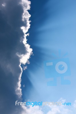 Sunlight Behind Cloud Stock Photo