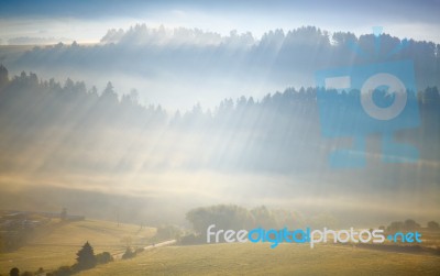 Sunlight Rays In The Alps Stock Photo