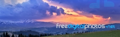 Sunny Spring Evening. April Mountain Sunset In Carpathians Stock Photo