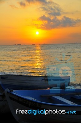 Sunrise And Sunset In The Beach Stock Photo